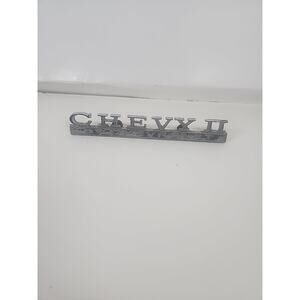 CHEVROLET CHEVY II EMBLEM ORNAMENT " CHEVY II " Part Number 7745749